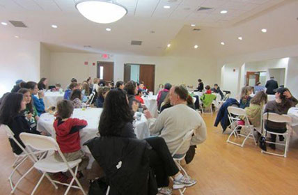 Members sitting at a shul event